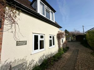 Side- click for photo gallery